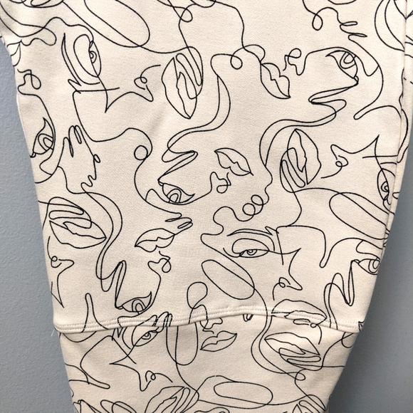 Wynne Lounge Pants With Faces on them.  Super comfortable & super soft.  Size M. - Picture 1 of 4